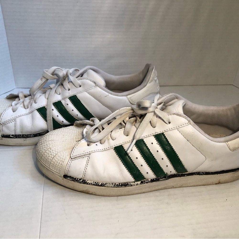 Mens Adidas green striped sneakers size 12.